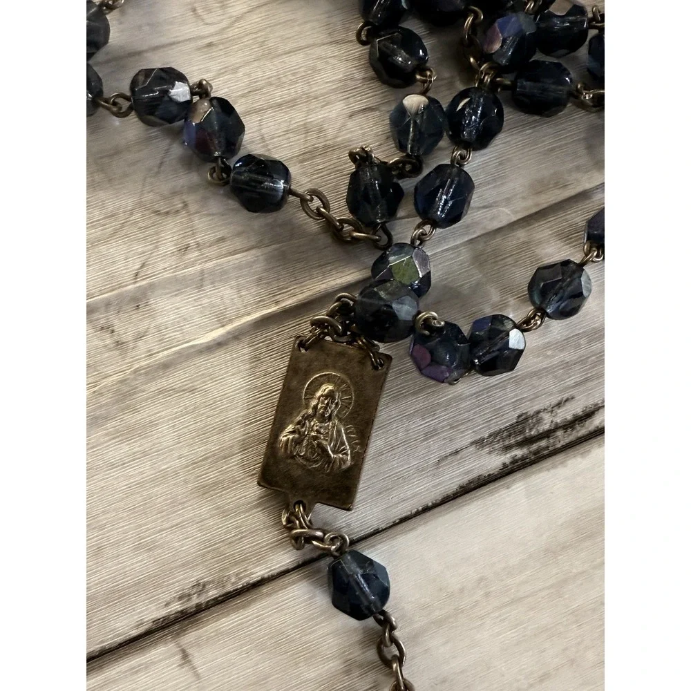 A vintage blue glass bead rosary with a silver-toned metal crucifix and medal. - Picture 4 of 10